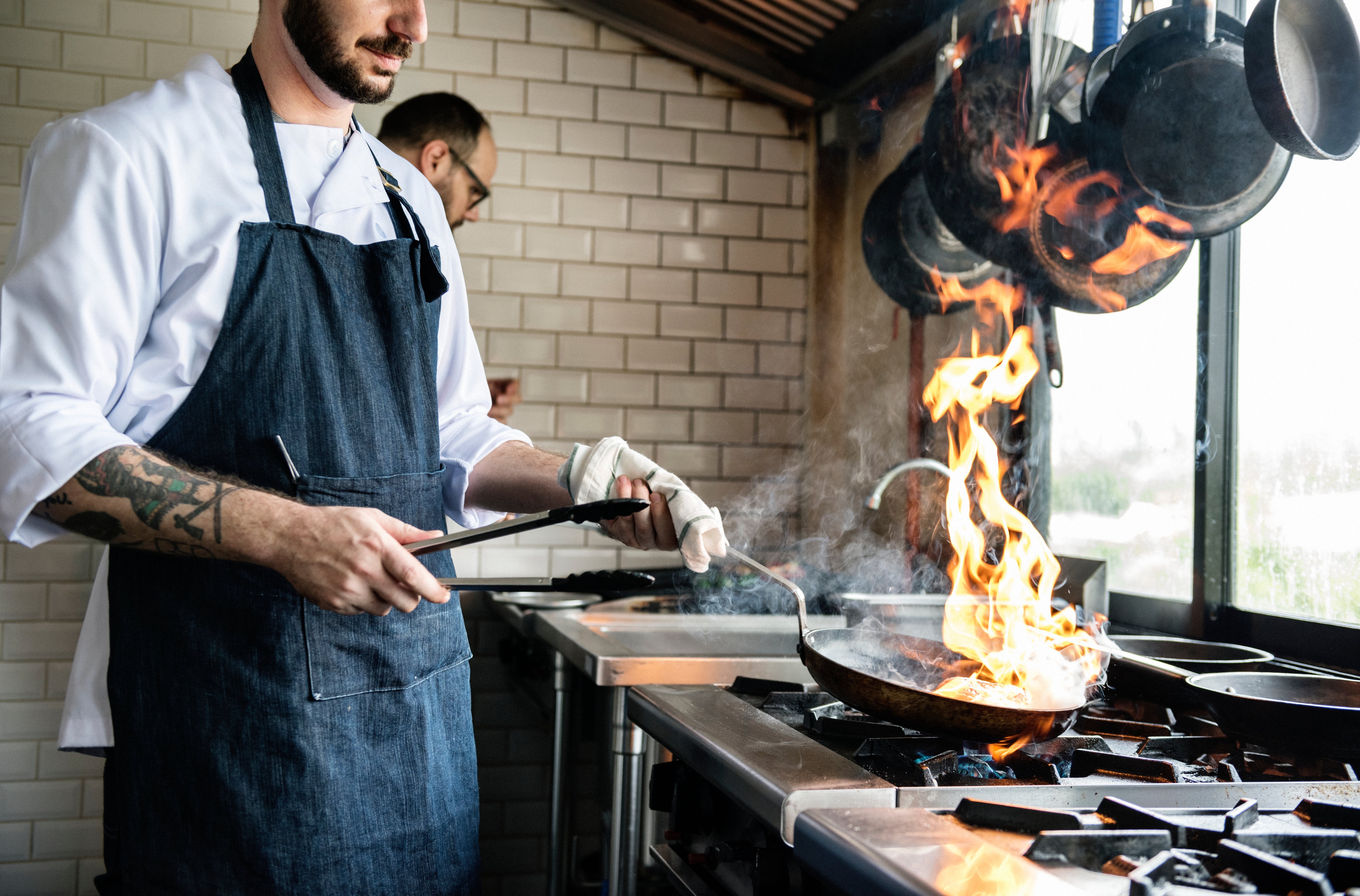 chef-cooking-food-in-the-restaurant-kitchen-2021-09-03-04-15-50-utc